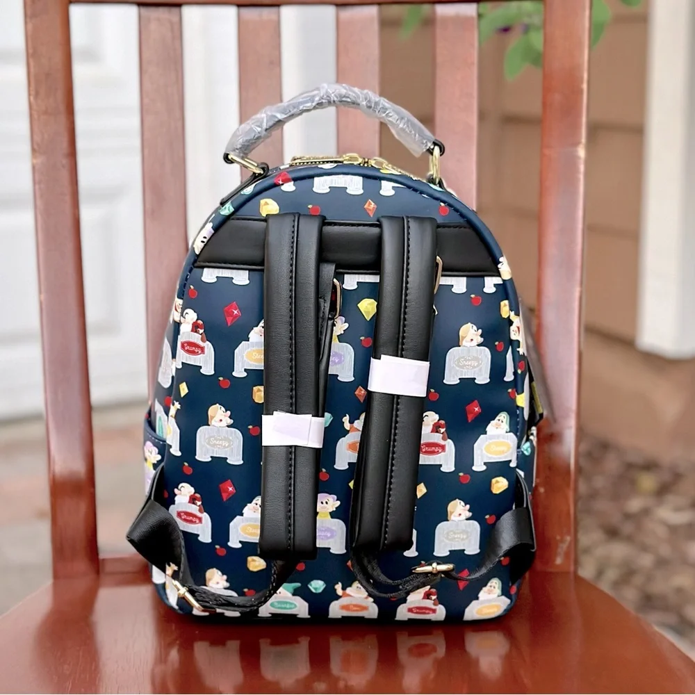 Loungefly Disney Snow White and the Seven Dwarves Allover Print Mini Backpack